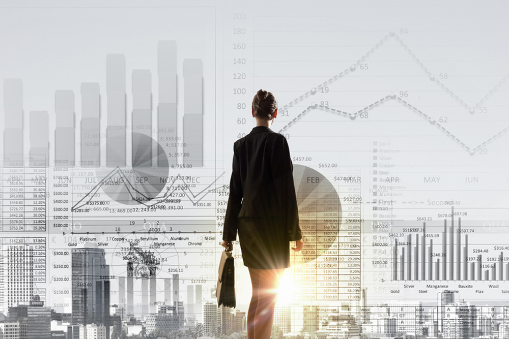 Rear-view-of-businesswoman-looking-at-business-marketing-strategy2